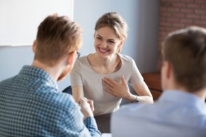 Man giving compliment to woman