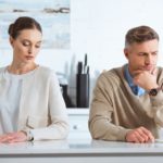 Man looking away from woman